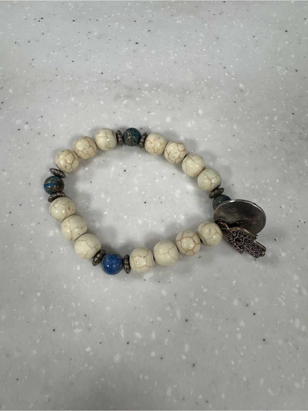 Cream and Blue Beaded Stretch Bracelet with Silver Karma Charm